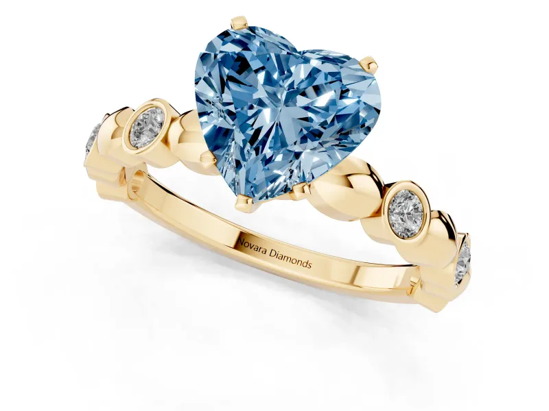 Heart-Shaped Station Engagement Ring Setting for a Fancy Blue Lab-Grown Diamond | Yellow Gold
