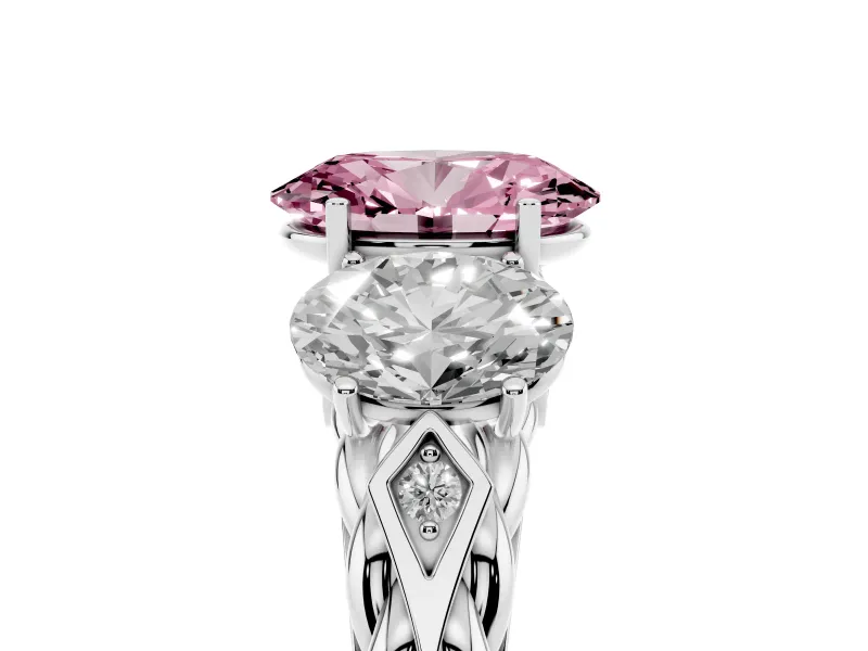 Fancy Pink Oval Cut Diamond Three-Stone Ring Set in Platinum with Braided Band