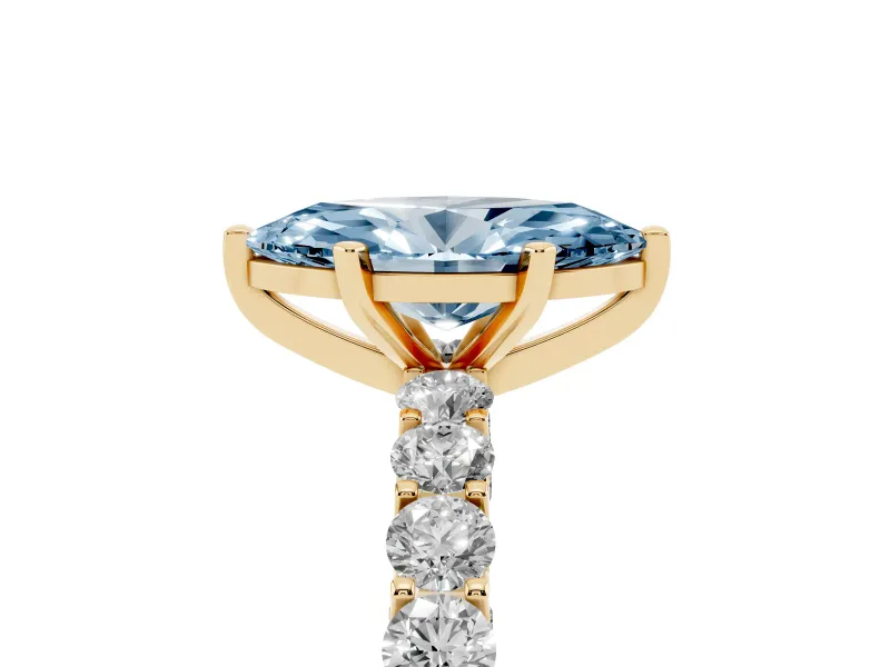 Fancy Blue Marquise Cut Diamond Solitaire Ring Set in Yellow gold with Shared Prong Pavé Band