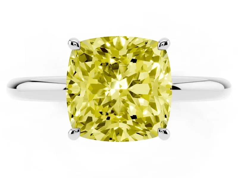 Fancy Yellow Cushion Cut Diamond Solitaire Ring Set in Platinum with Thin Band and Prong Setting