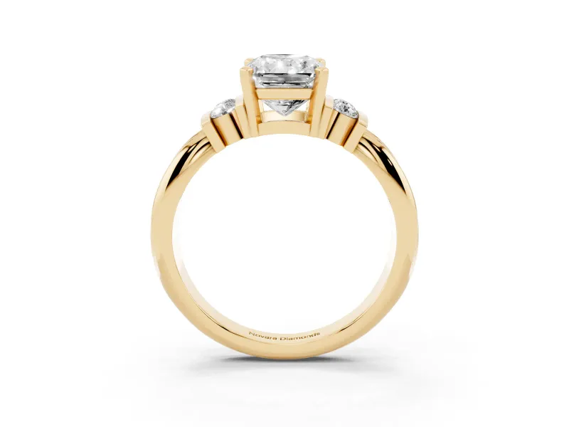 Three-Stone Radiant Cut Diamond Channel Set Ring Set in Yellow gold with Bar Prongs