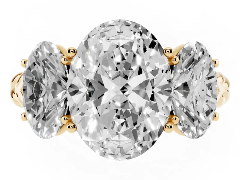 Oval Cut Diamond Three-Stone Ring Set in Yellow gold with Braided Band