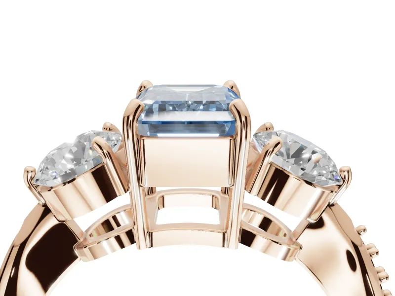 Emerald Cut Three Stone Engagement Ring Setting for a Fancy Blue Lab-Grown Diamond | Tapered Pave Band | Rose Gold