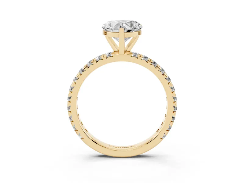 Heart Cut Diamond Pavé Solitaire Ring Set in Yellow gold with Round Band and Prong Setting