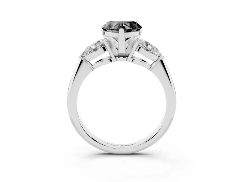 Fancy Black Three-Stone Heart Cut Diamond Ring Set in White gold with Pear Side Stones and Prong Setting