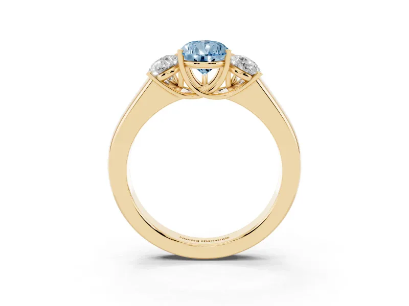 Fancy Blue Three-Stone Pear Cut Diamond Ring Set in Yellow gold with Matching Prong Settings and Plain Band