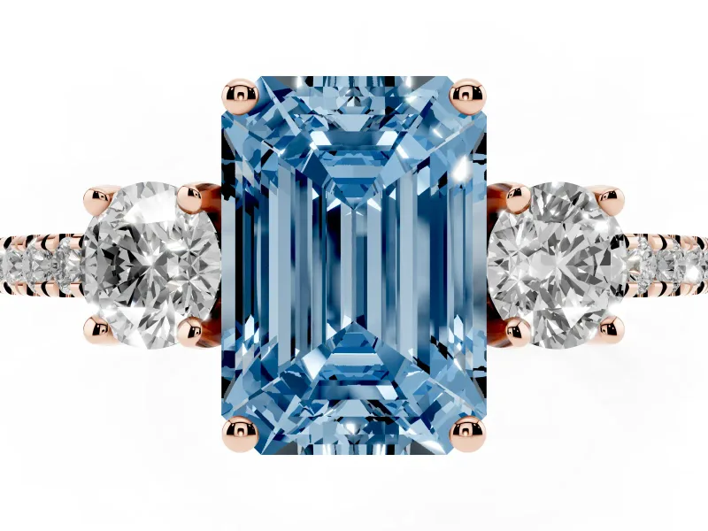 Emerald Cut Three Stone Engagement Ring Setting for a Fancy Blue Lab-Grown Diamond | Pave Shoulders | Rose Gold