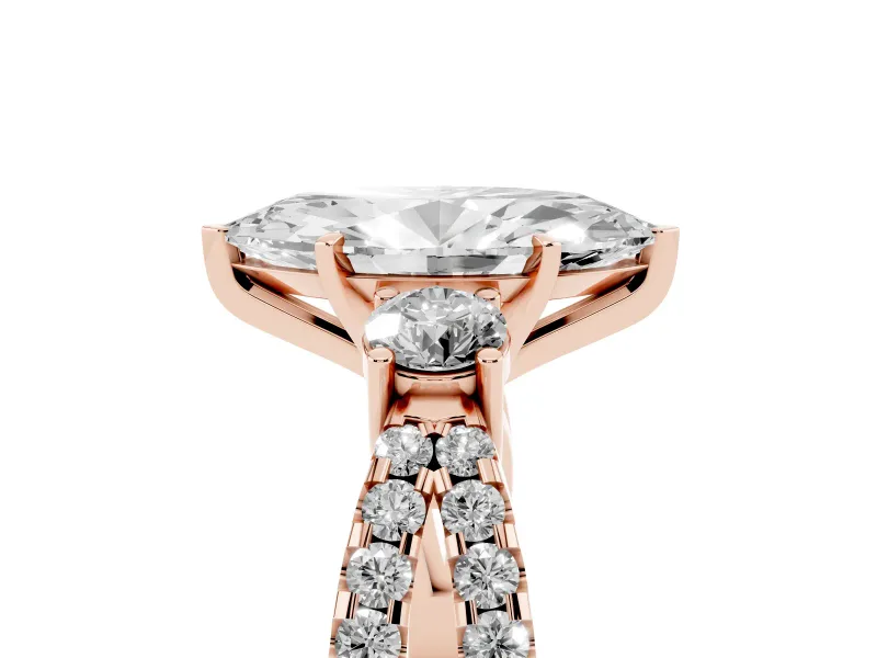 Marquise Cut Diamond Three-Stone Ring Set in Rose gold with Pavé Split Shank and Prong Setting