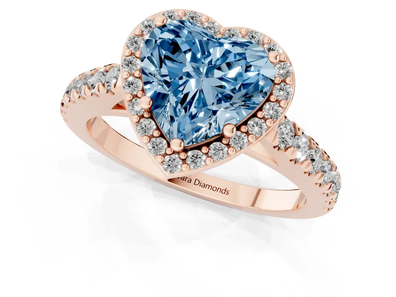 Fancy Blue Heart Cut Diamond Halo Engagement Ring Set in Rose gold with Pavé Band and Prong Setting