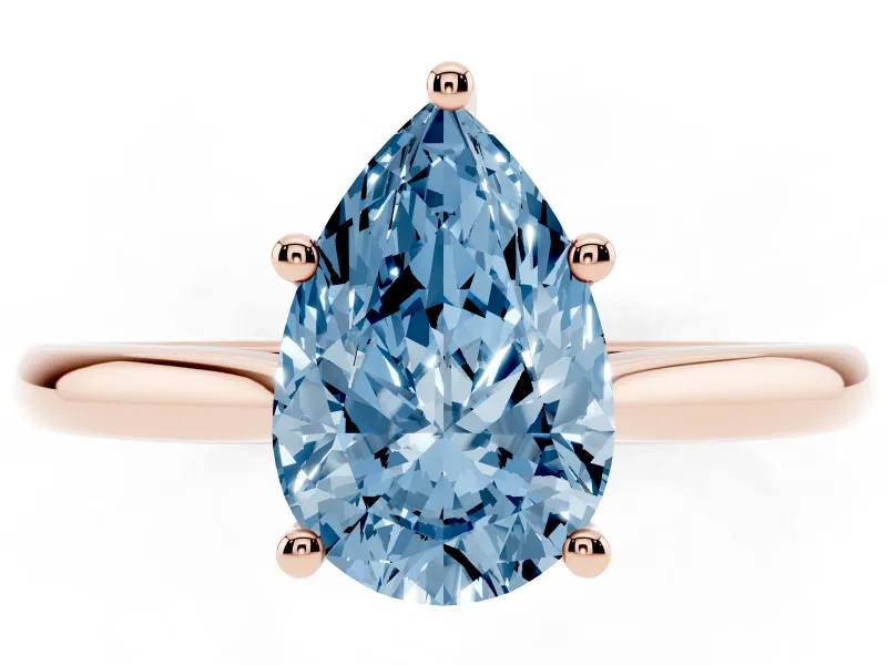 Fancy Blue Pear Cut Diamond Solitaire Ring Set in Rose gold with Cathedral Band and Prong Setting