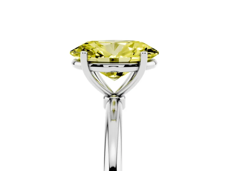 Fancy Yellow Oval Cut Diamond Solitaire Engagement Ring Set in Silver with Thin Band and Prong Setting