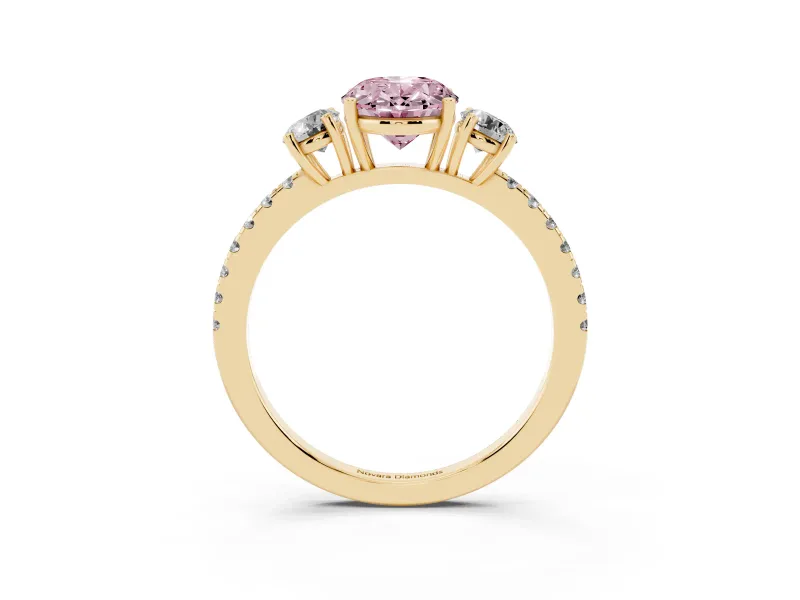 Fancy Pink Oval Cut Diamond Three-Stone Ring Set in Yellow gold with Pavé Band and Graduated Sides