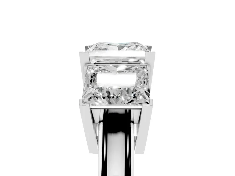 Princess Cut Diamond Three-Stone Ring Set in White gold with Channel-Set Band and Prong Settings