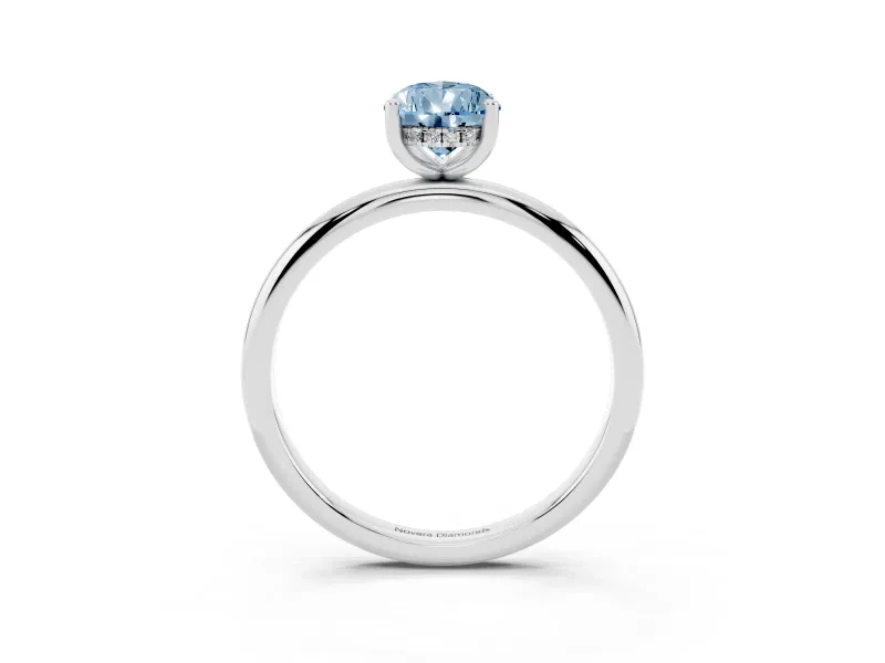 Fancy Blue Pear Cut Diamond Solitaire Engagement Ring Set in White gold with Prong Setting and Polished Band