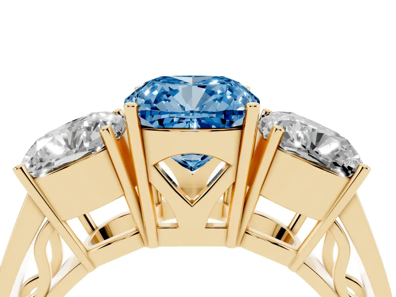 Fancy Blue Cushion Cut Diamond Three-Stone Ring Set in Yellow gold with Textured Band