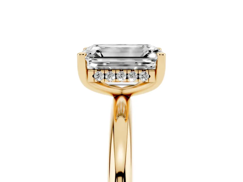 Emerald Cut Diamond Solitaire Engagement Ring Set in Yellow gold with Prong Setting and Polished Band