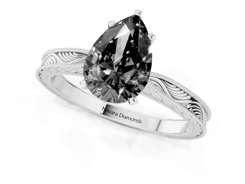 Fancy Black Pear Cut Diamond Solitaire Milgrain Engraved Band Set in Silver with Prong Setting