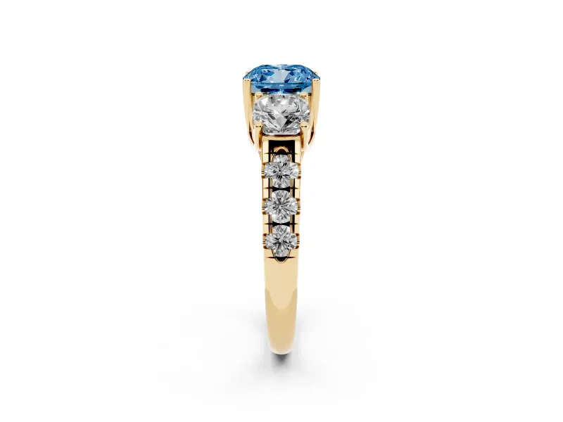Fancy Blue Cushion Cut Diamond Three-Stone Ring Set in Yellow gold with Pavé Band