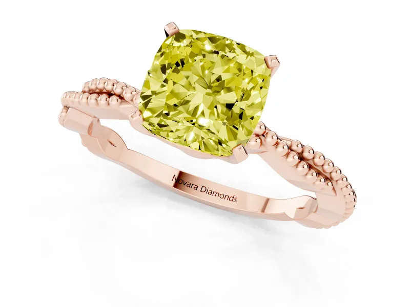 Fancy Yellow Cushion Cut Diamond Solitaire Ring Set in Rose gold with Twisted Band and Bead Prong Setting