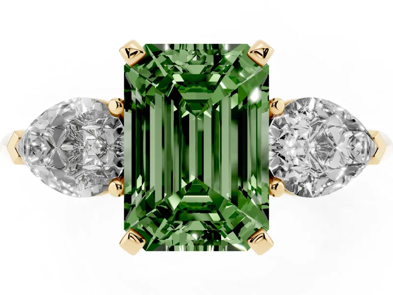 Fancy Green Three-Stone Emerald Cut Diamond Ring Set in Yellow gold with Pear Side Stones and Prong Setting