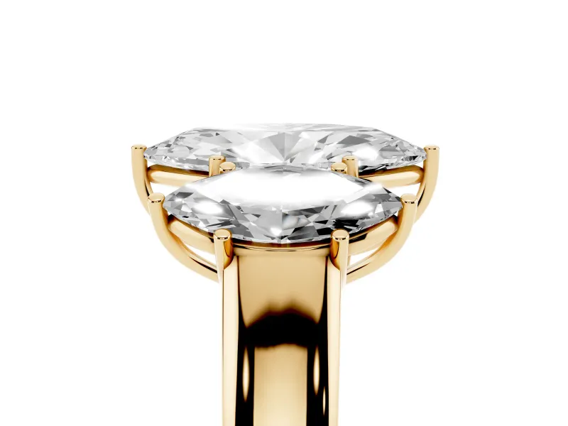 Three-Stone Marquise Cut Diamond Ring Set in Yellow gold with Matching Prong Settings and Plain Band