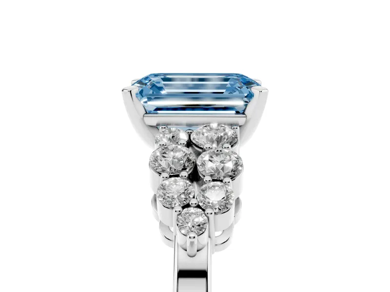 Fancy Blue Emerald Cut Diamond Cluster Engagement Ring Set in White gold with Pavé Band and Prong Setting