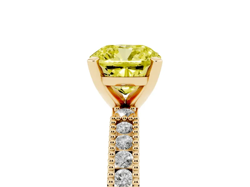 Fancy Yellow Cushion Cut Diamond Solitaire Ring Set in Yellow gold with Slim Pavé Band and Prong Setting