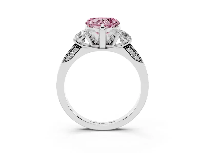 Fancy Pink Heart Cut Diamond Three-Stone Ring Set in Platinum with Pavé Band and Smaller Side Stones