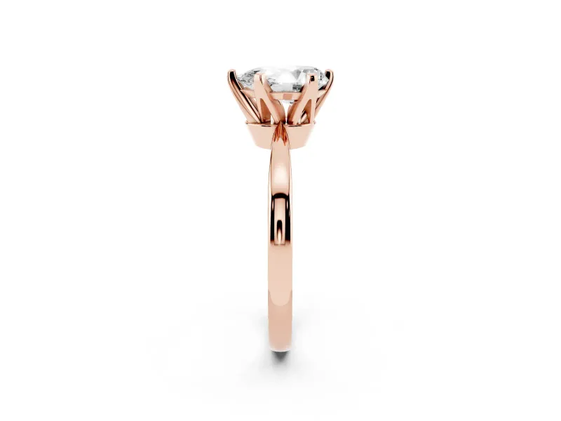 Pear Cut Diamond Solitaire Engagement Ring Set in Rose gold with Slim Tapered Solitaire Band