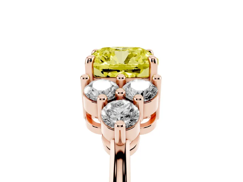 Fancy Yellow Cushion Cut Diamond Solitaire Ring Set in Rose gold with Cluster Accents on Each Side