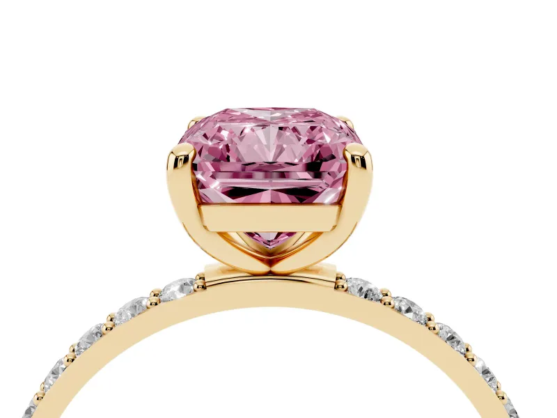 Fancy Pink Radiant Cut Diamond Solitaire Ring Set in Yellow gold with Round Pavé Band and Prong Setting