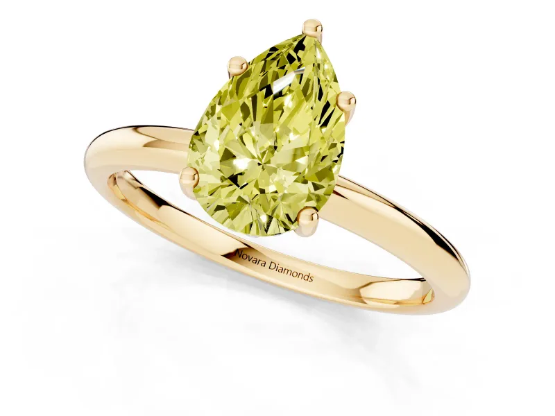 Fancy Yellow Pear Cut Diamond Solitaire Engagement Ring Set in Yellow gold with Prong Setting and Polished Band