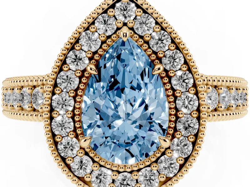 Pear-Shaped Milgrain Halo Engagement Ring Setting for a Fancy Blue Lab-Grown Diamond | Carved Leaf Detail | Yellow Gold