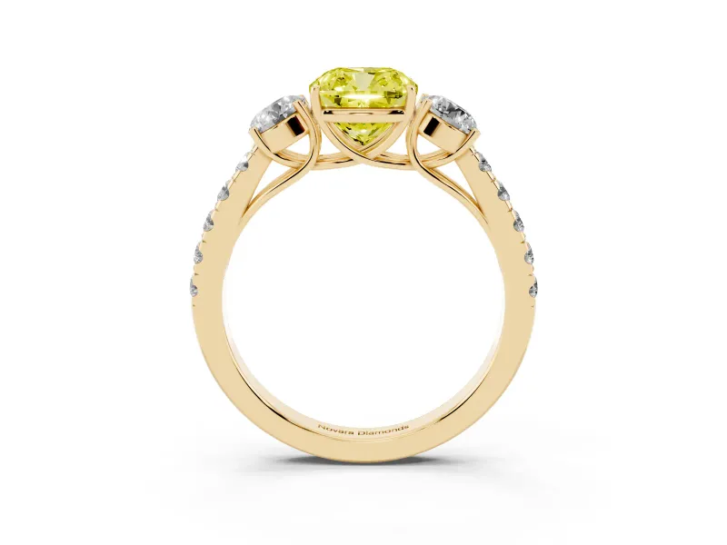 Fancy Yellow Cushion Cut Diamond Three-Stone Ring Set in Yellow gold with Round Side Stones and Delicate Pavé Band