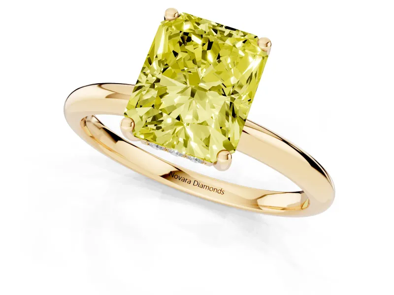 Fancy Yellow Radiant Cut Diamond Solitaire Engagement Ring Set in Yellow gold with Prong Setting and Polished Band