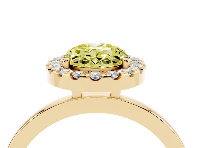 Fancy Yellow Oval Cut Diamond Halo Solitaire Ring Set in Yellow gold with Pavé Band and Prong Setting