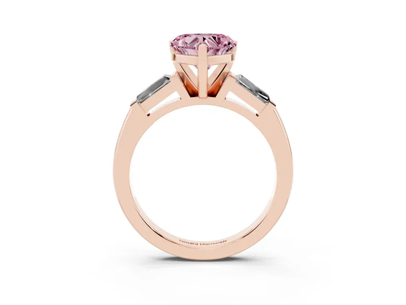Fancy Pink Heart Cut Diamond Solitaire Ring Set in Rose gold with Tapered Baguette Side Stones and Prong Setting