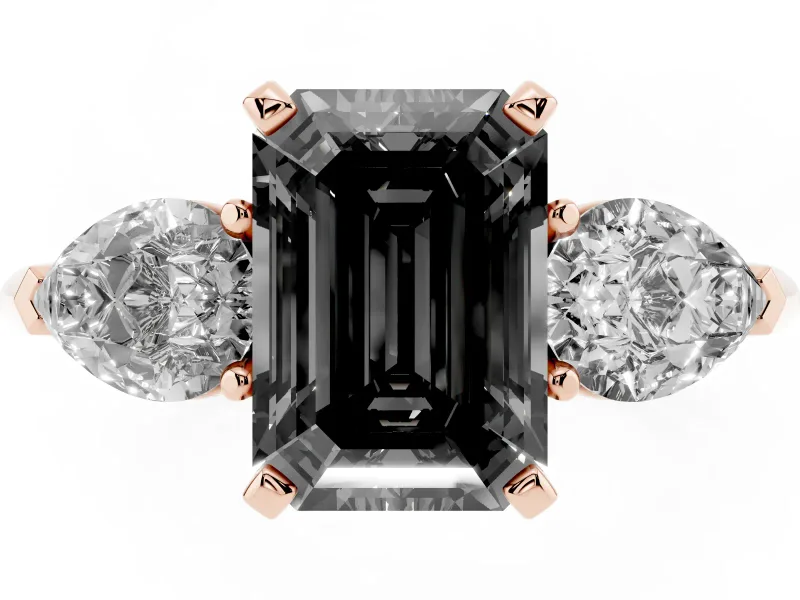 Fancy Black Three-Stone Emerald Cut Diamond Ring Set in Rose gold with Pear Side Stones and Prong Setting