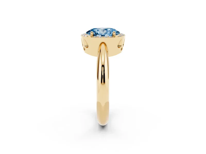 Fancy Blue Oval Cut Diamond Halo Engagement Ring Set in Yellow gold with Plain Split Shank and Prong Setting