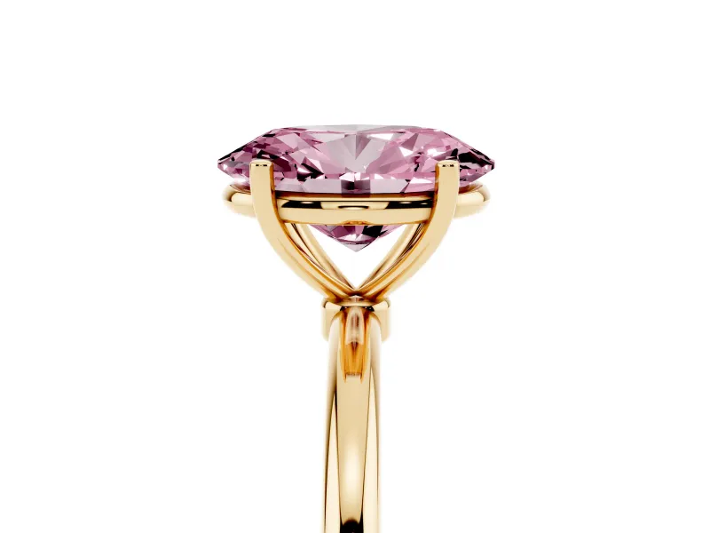 Fancy Pink Oval Cut Diamond Solitaire Engagement Ring Set in Yellow gold with Thin Band and Prong Setting