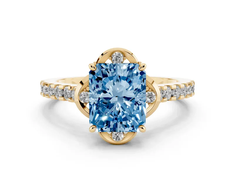 Fancy Blue Radiant Cut Diamond Solitaire Ring Set in Yellow gold with Pavé Band and Floral Prong Setting