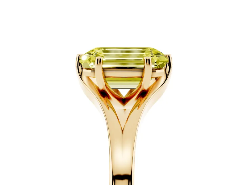 Fancy Yellow Emerald Cut Diamond Solitaire Ring Set in Yellow gold with Polished Tapered Band and Prong Setting