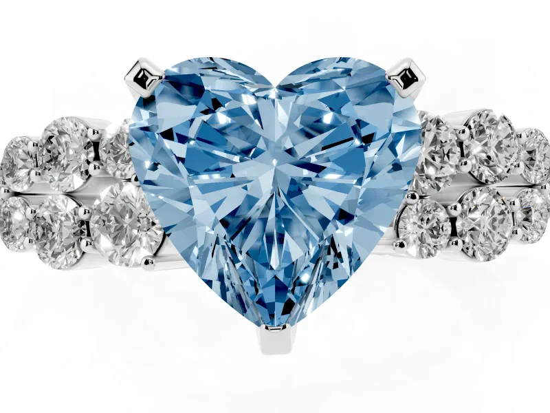 Fancy Blue Heart Cut Diamond Cluster Engagement Ring Set in Platinum with Pavé Band and Prong Setting