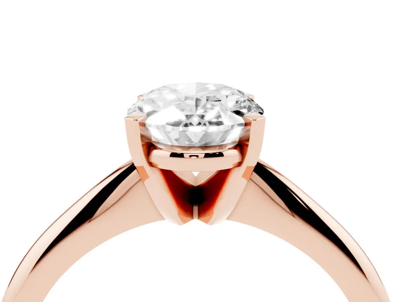 Oval Cut Diamond Solitaire Ring Set in Rose gold with Prong Setting on a Plain Round Band