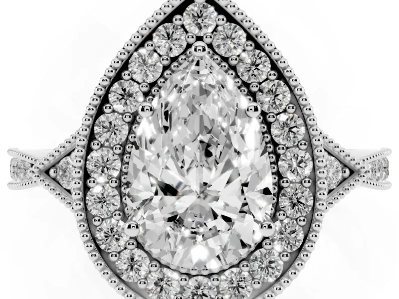 Pear Cut Diamond Halo Engagement Ring Set in Platinum with Milgrain Pavé Band
