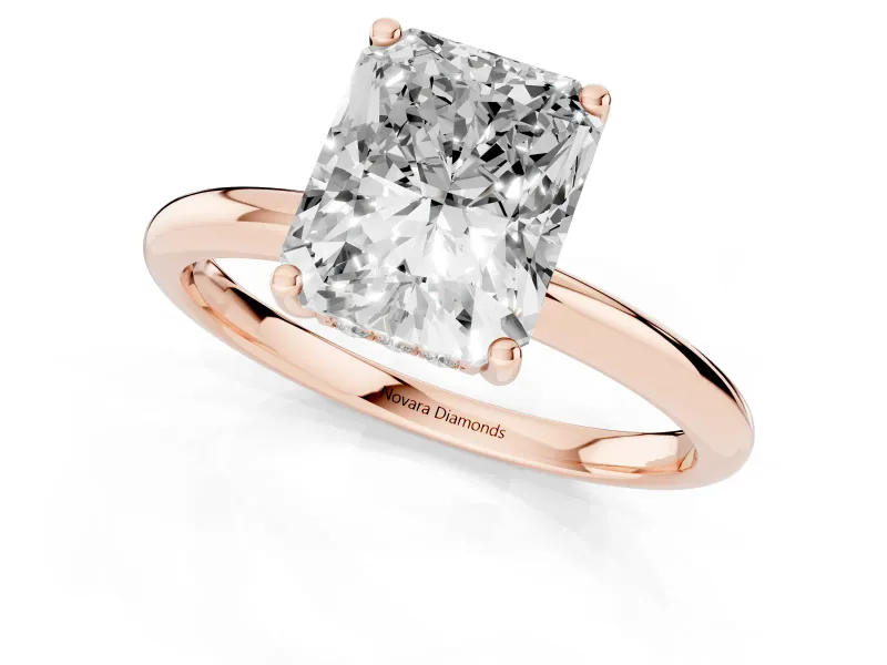 Radiant Cut Diamond Solitaire Engagement Ring Set in Rose gold with Prong Setting and Polished Band