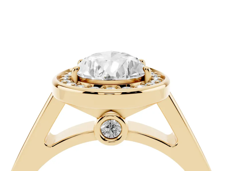 Pear Cut Diamond Halo Solitaire Ring Set in Yellow gold with Pavé Band and Bezel Setting