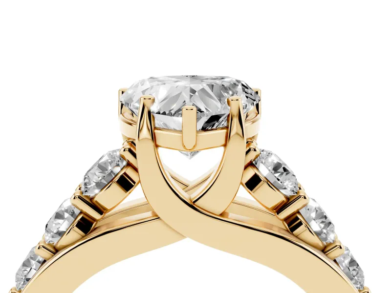 Heart-Shaped Graduated Side Stone Engagement Ring Setting | Shared Prong Rails | Yellow Gold