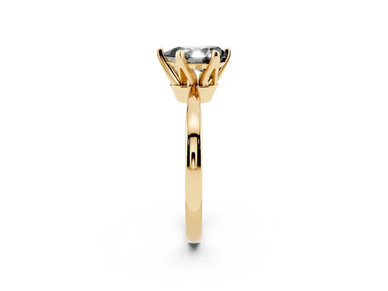 Fancy Black Pear Cut Diamond Solitaire Engagement Ring Set in Yellow gold with Slim Tapered Solitaire Band