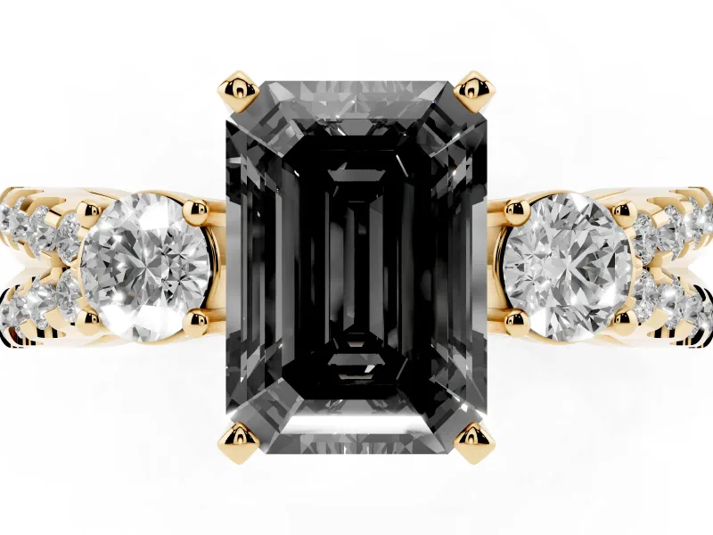 Fancy Black Emerald Cut Diamond Three-Stone Ring Set in Yellow gold with Pavé Split Shank and Prong Setting